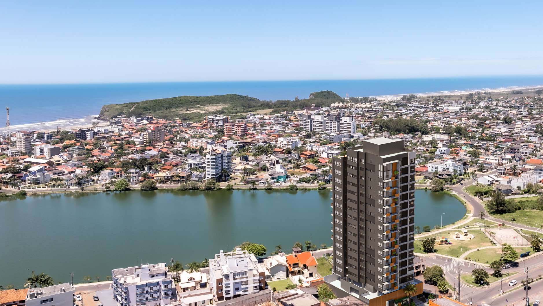 Vista aérea Lagos Residencial junto à Lagoa do Violão com Morro do Farol e mar ao fundo