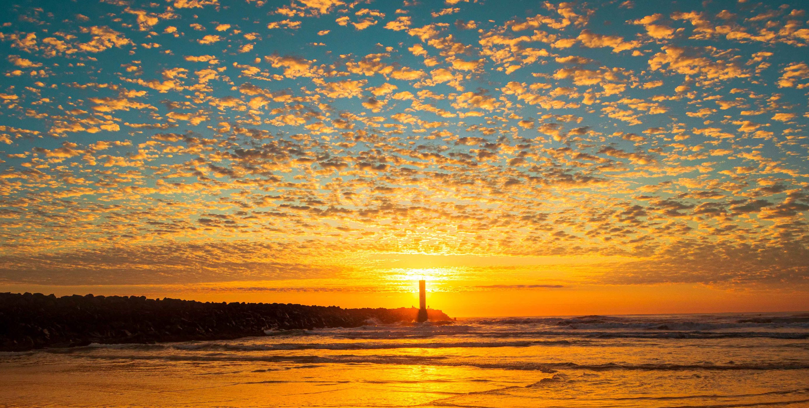 Pôr do sol Praia dos Molhes Torres RS